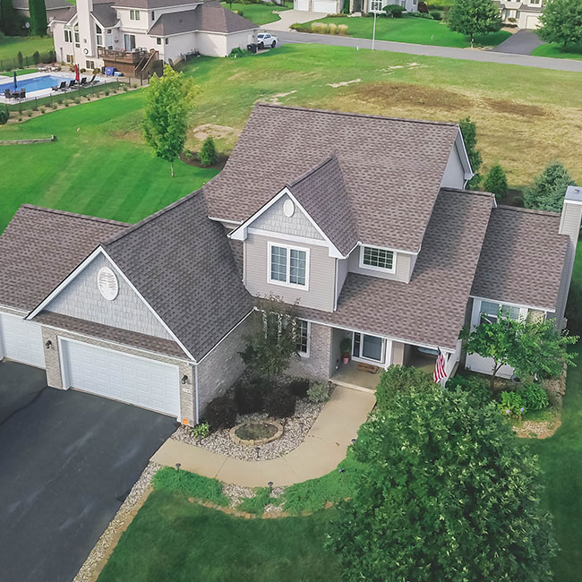 residential property with newly installed roof seen from above lansing mi