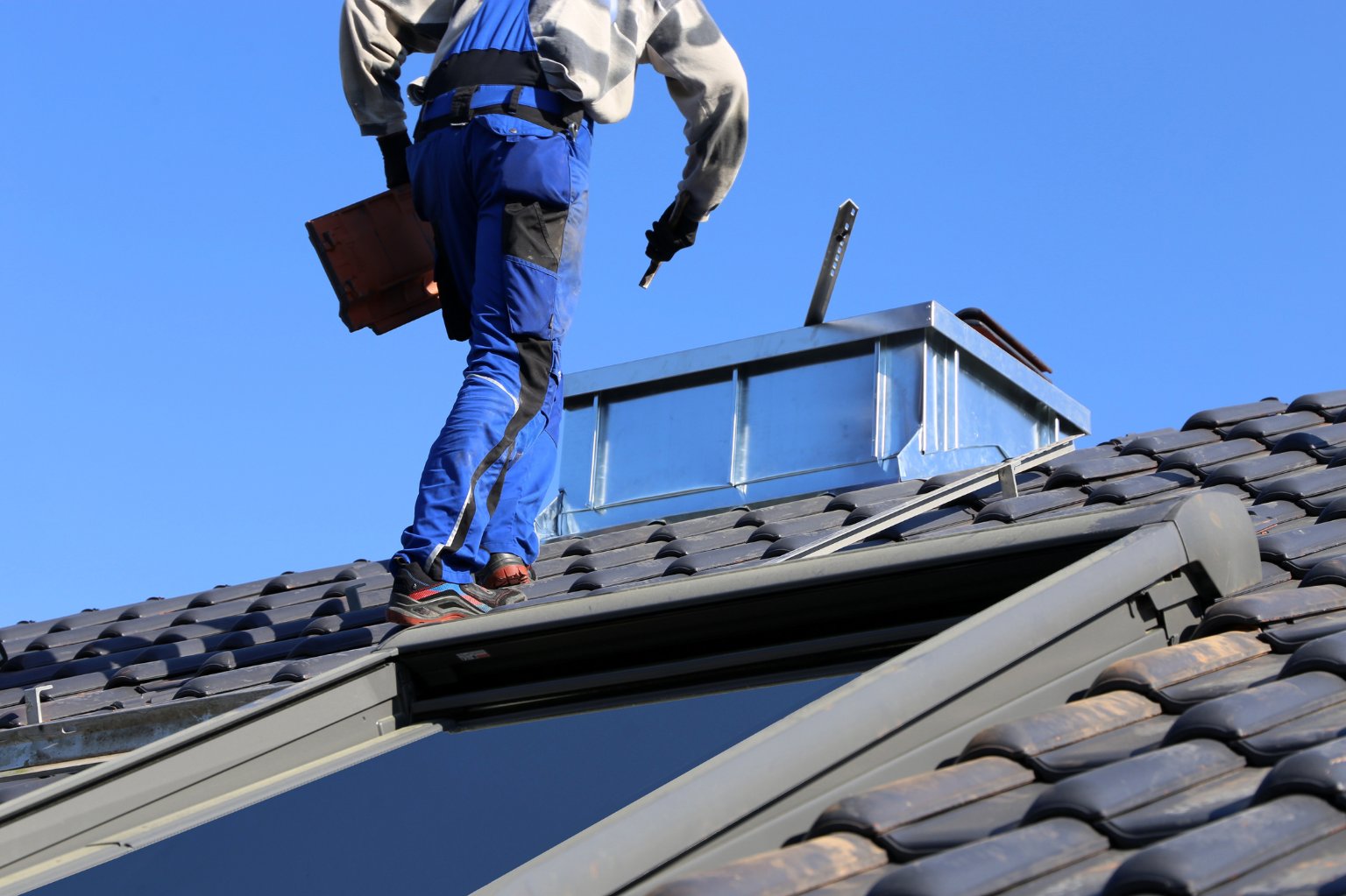 roof repair Grosse Ile